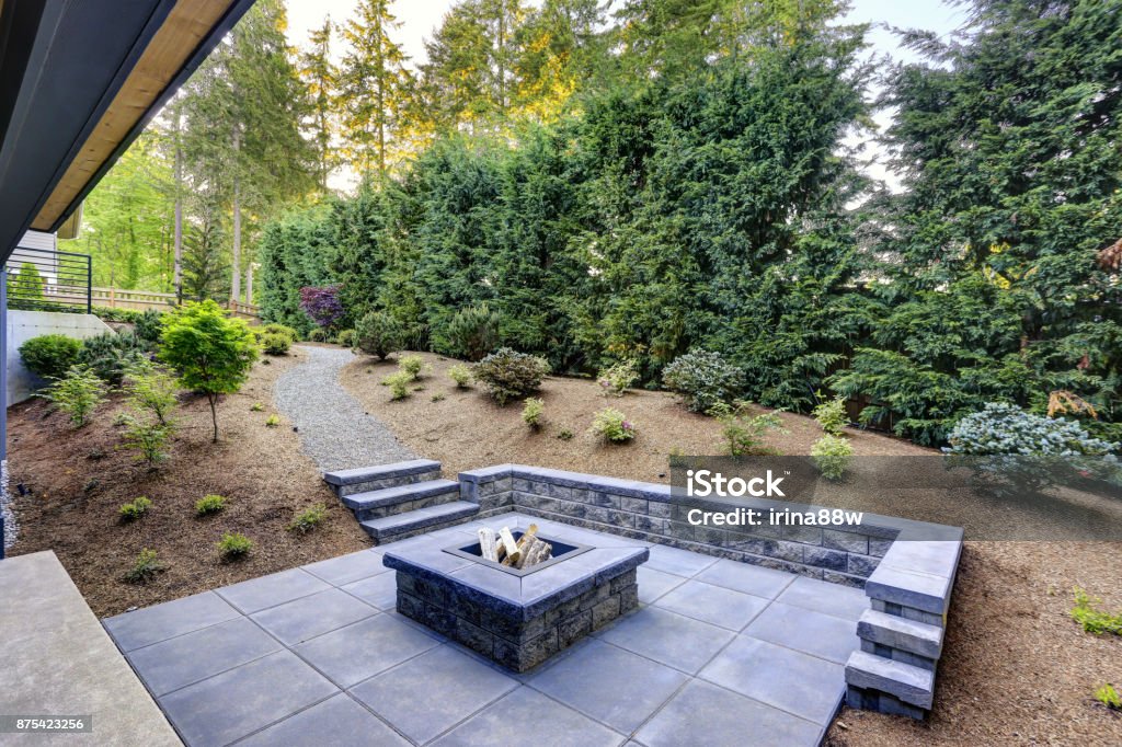 Stone paver patio with landscaping